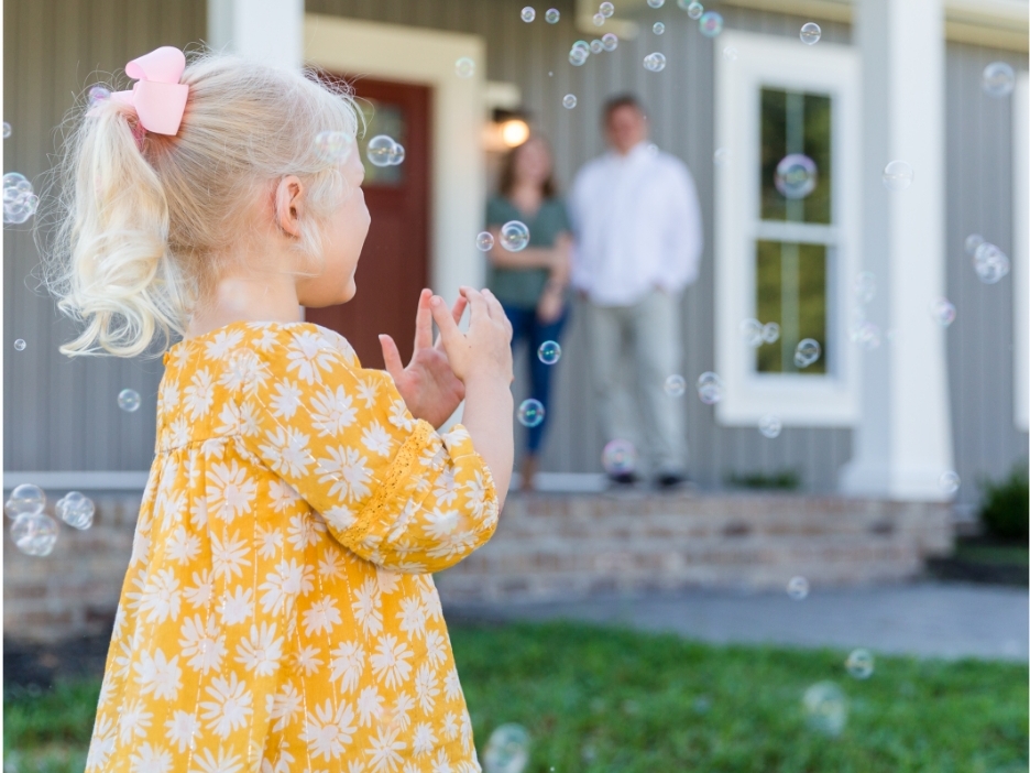 Rock River Homes Photography Enso Media Little Girl with Bubbles